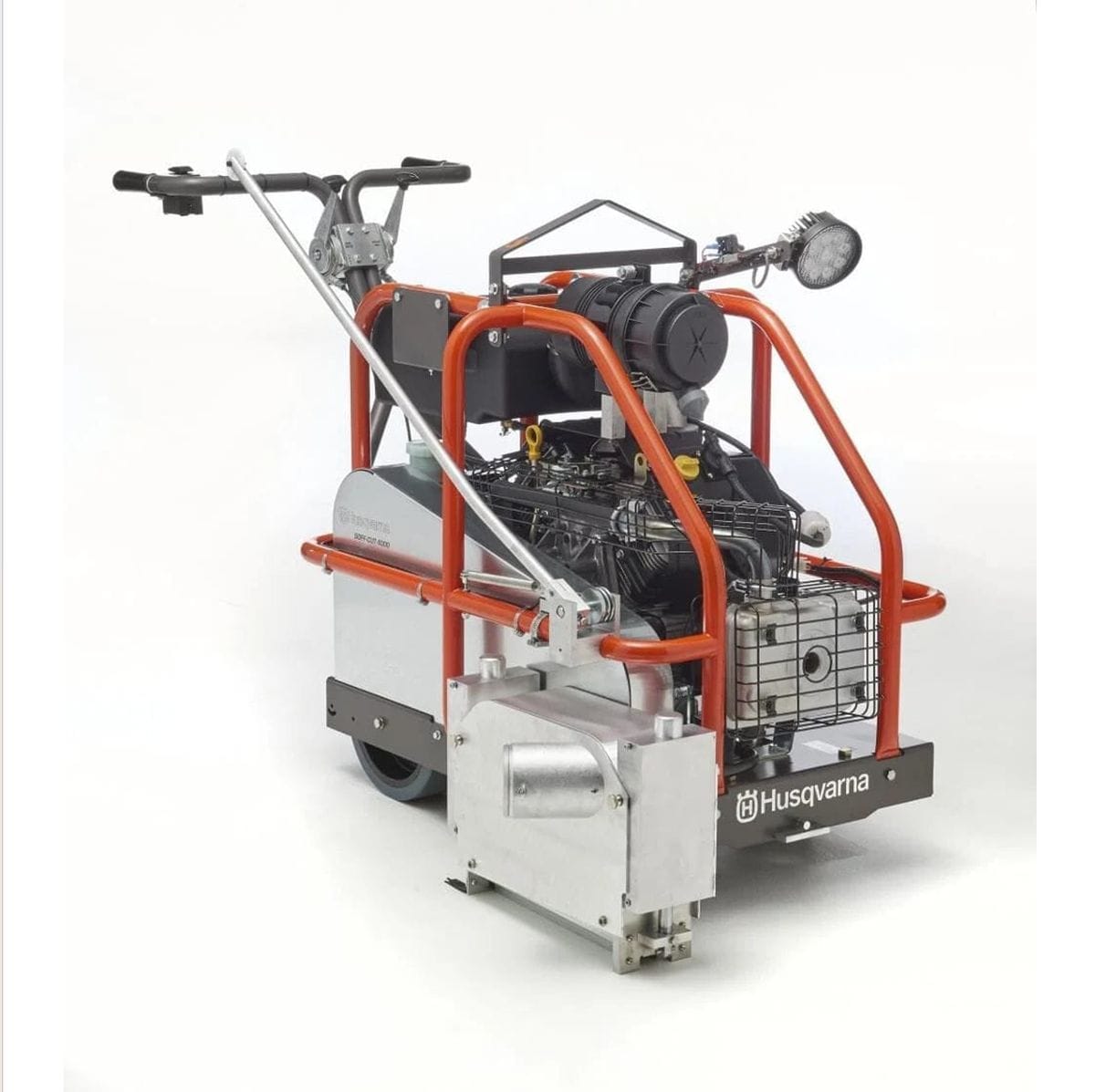 A studio product shot of the Husqvarna Soff-Cut 4000 self-propelled saw against a white background, featuring a robust orange roll cage, silver protective paneling, and a large black canister air filter.