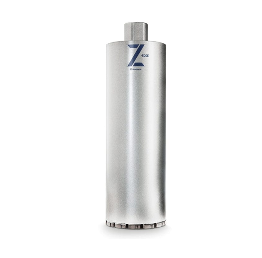 A professional studio photograph of the Husqvarna Vari-Drill B30 diamond core bit, featuring a 2-1/4-inch diameter silver metallic tube with a blue Z-Edge logo and a threaded mounting hub for wet coring.