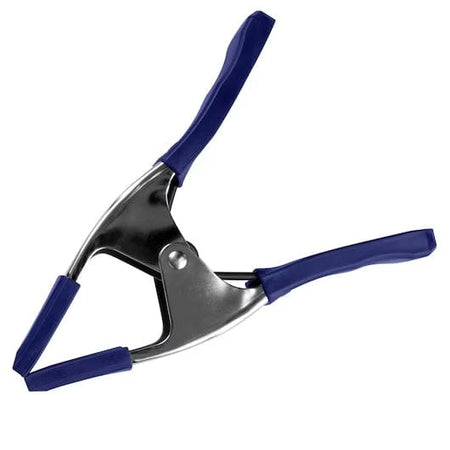 Side profile studio shot of the IRWIN 3-inch spring clamp in the closed position, illustrating the overall shape and vinyl-coated handles