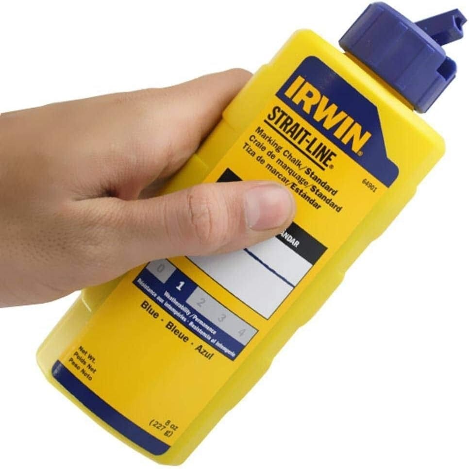 Handheld view of the IRWIN 64901 marking chalk bottle showing the blue flip-top cap designed for airtight storage and easy mess-free refilling of chalk reels on the jobsite.