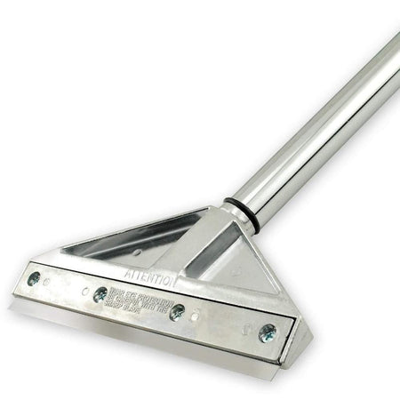Detailed angled view of the die-cast metal scraper head holding the blade securely with four screws. Stamped text on the metal head reads "ATTENTION WEAR EYE PROTECTION BE CAREFUL WITH THE SHARP BLADE".