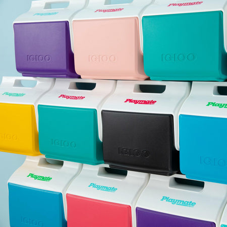 Stack of Igloo Playmate Mini coolers in assorted colors, each with a white tent-top lid and colored base. “Playmate” printed on the lid and “Igloo” embossed on the body. Arranged in a grid pattern for visual appeal.