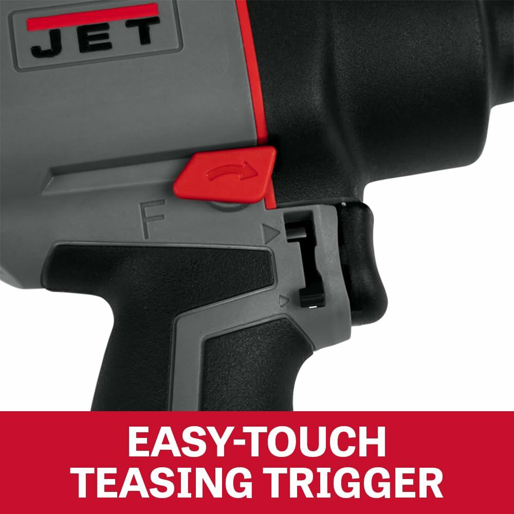 Close-up of the trigger mechanism of the impact wrench, labeled EASY-TOUCH TEASING TRIGGER for precise speed control.