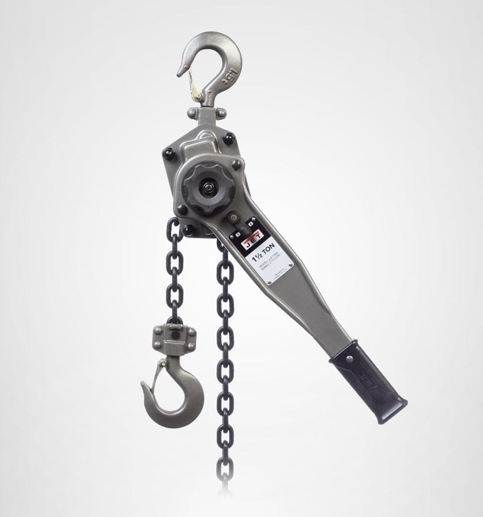 Angled studio shot of the lever chain hoist showing the ratchet handle, gear housing, and the full length of the chain and hook assembly.