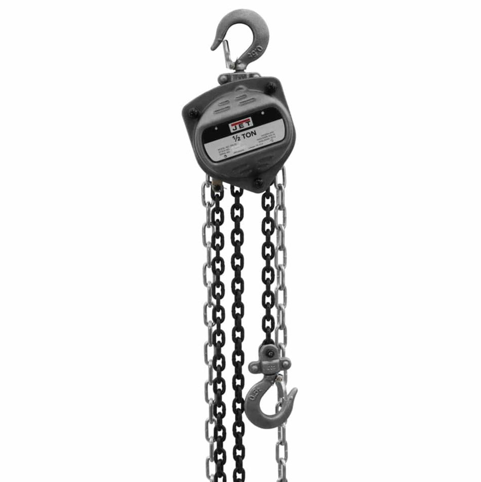 Product studio shot from a direct front view of the JET S90 Series 1/2 Ton Hand Chain Hoist against a clear white background, showcasing its compact industrial grey steel body casing with a black label detailing "JET 1/2 TON," an upper heavy-duty safety latch hook for overhead mounting, a premium drop-forged lower cargo hook, and long dangling loops of robust black steel Grade 80 load chain alongside a silver-finished hand pull chain line.