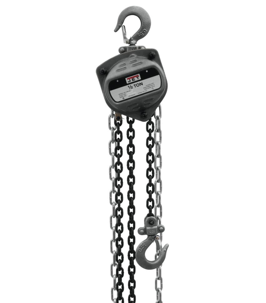 Product studio shot from a direct front view of the JET S90 Series 1/2 Ton Hand Chain Hoist against a clear white background, showcasing its compact industrial grey steel body casing with a black label detailing "JET 1/2 TON," an upper heavy-duty safety latch hook for overhead mounting, a premium drop-forged lower cargo hook, and long dangling loops of robust black steel Grade 80 load chain alongside a silver-finished hand pull chain line.
