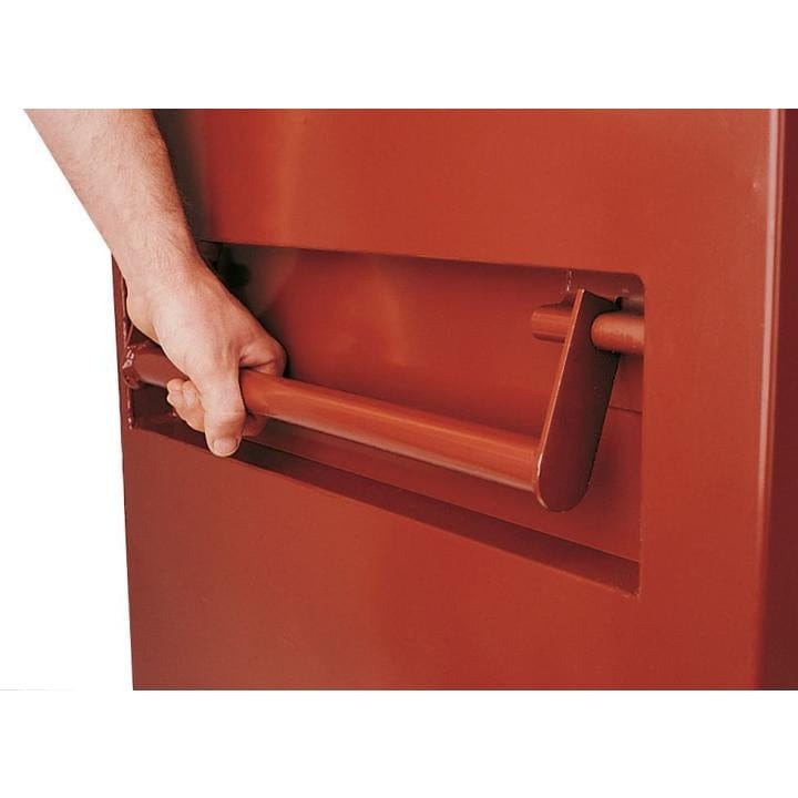 Hand gripping a horizontal metal handle on the side of a red JOBOX cabinet, illustrating manual latch or door operation.