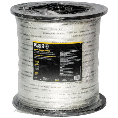 Factory shrink-wrapped Klein Tools 50142 3000-foot pull tape reel displaying the specification label and 2500-lb tensile rating.