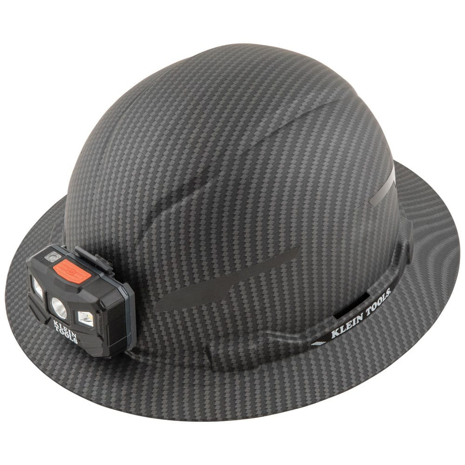Klein Tools 60346 Class E full brim hard hat in KARBN pattern with integrated LED headlamp for high-voltage electrical job site safety
