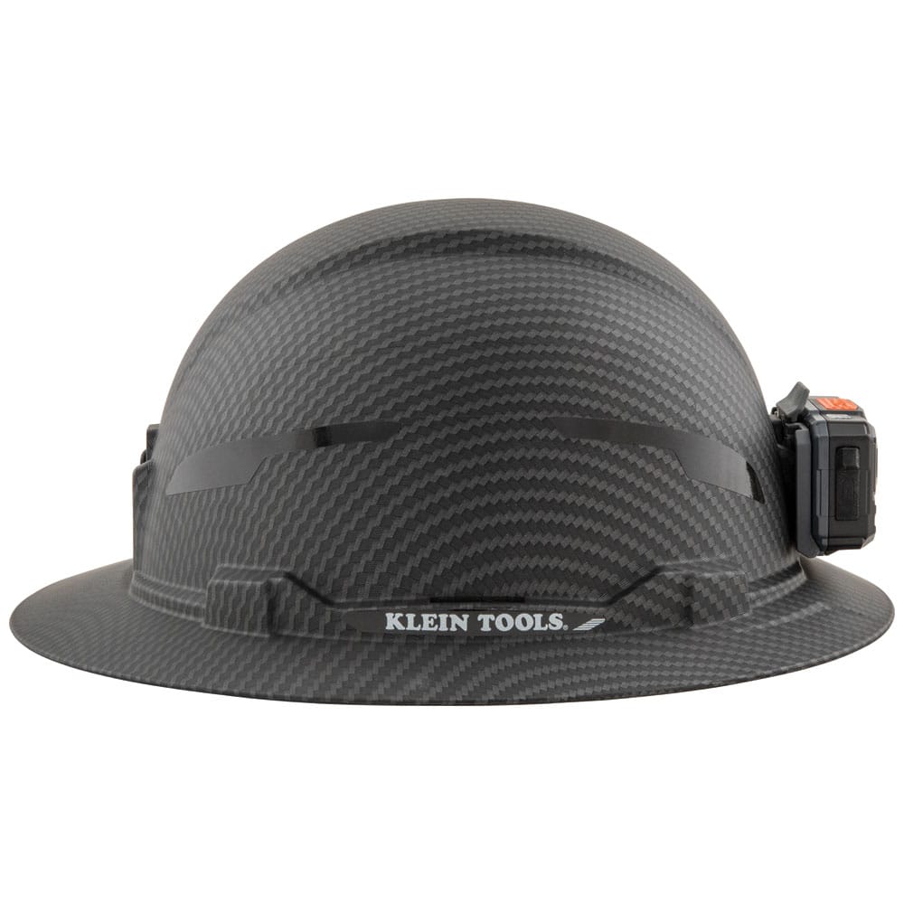 Side profile view of the Klein Tools KARBN Class E hard hat showing full brim sun protection and secure headlamp attachment.