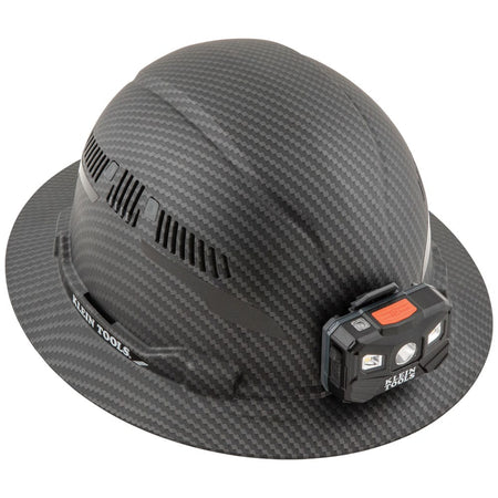 Top isometric view highlighting the sliding ventilation louvers on the Klein Tools Class C KARBN hard hat shell.