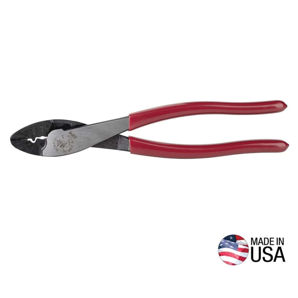 A professional product photograph of the Klein Tools 1005 9-inch crimper and wire cutter featuring red plastic-dipped handles and a Made in USA emblem, designed for 10-22 AWG insulated and non-insulated terminals.