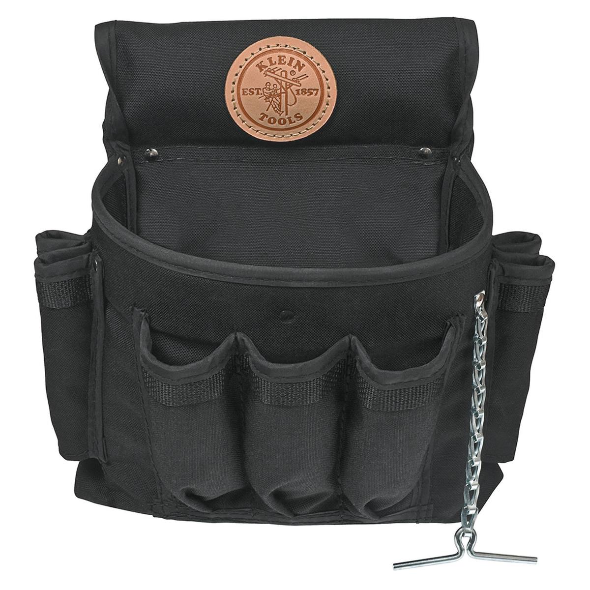 Close-up of the Klein Tools 12-pocket tool pouch made from durable black Cordura fabric, featuring a leather logo patch and a metal chain tape thong for organized gear storage.