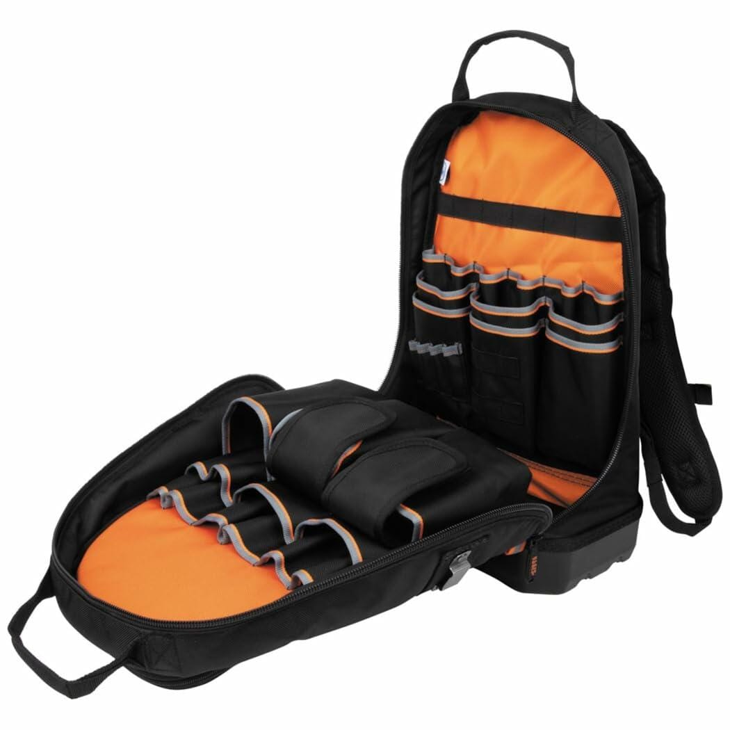 Open Klein Tools backpack with orange interior showing multiple compartments, elastic loops, and vertical pockets for organized tool storage.