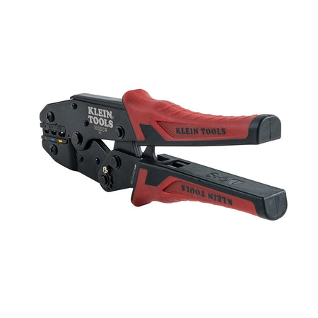 A perspective view of the ratcheting crimper in a closed position, highlighting the ergonomic handle shape and the durable steel construction of the tool body.