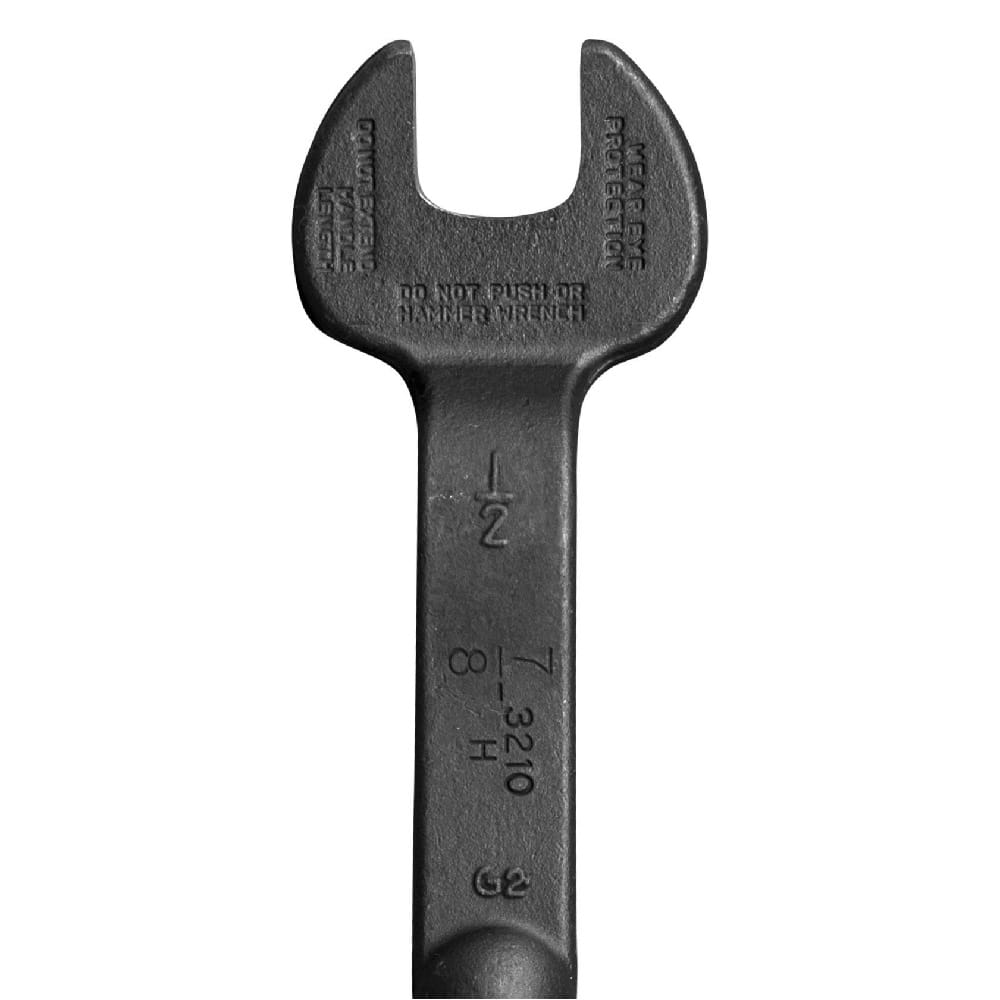 Close-up of the extra heavy-duty head on the Klein Tools 3210 spud wrench, displaying the 7/8 inch nominal opening and stamped metal markings for 1/2 inch heavy nuts and 9/16 inch regular nuts.