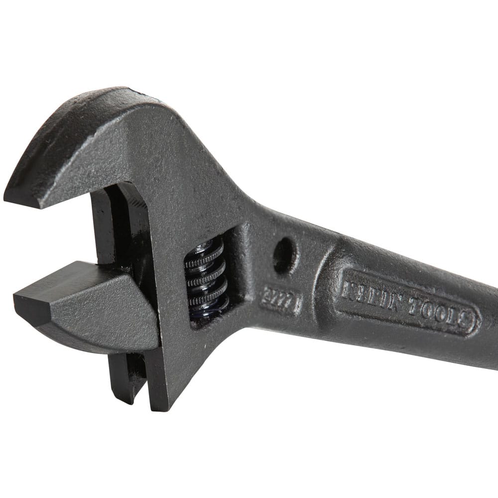 Close‑up of a Klein Tools 3227 Adjustable Spud Wrench with movable jaw and alloy steel body, designed for tightening heavy‑duty fasteners and aligning bolt holes in construction applications.