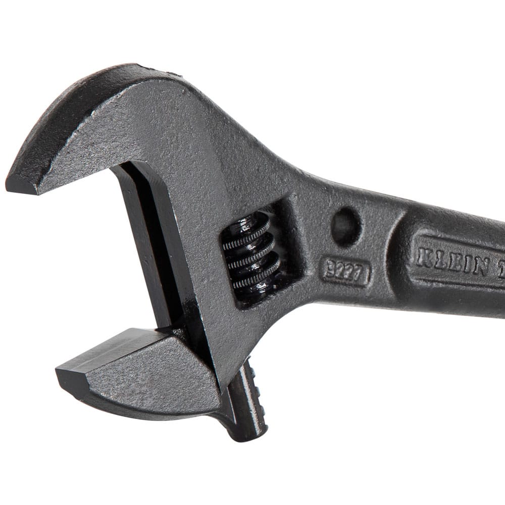 Close‑up of a Klein Tools 3227 Adjustable Spud Wrench showing worm‑gear jaw adjustment and alloy steel construction for heavy‑duty bolt tightening and alignment tasks.