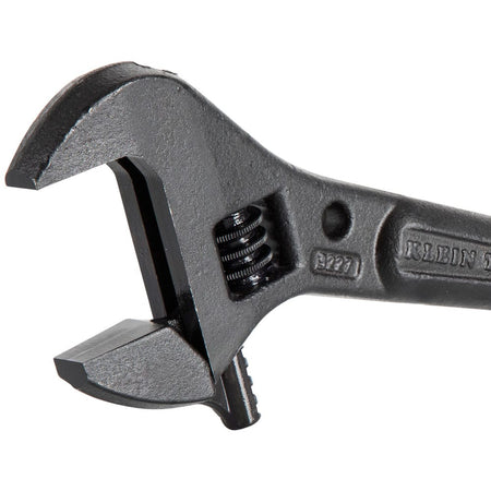 Close‑up of a Klein Tools 3227 Adjustable Spud Wrench showing worm‑gear jaw adjustment and alloy steel construction for heavy‑duty bolt tightening and alignment tasks.