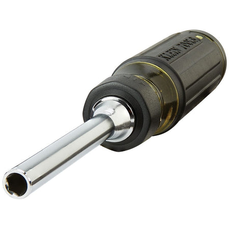 Studio shot of the tool with the bit holding shaft removed to expose the integrated 1/4 inch nut driver barrel.