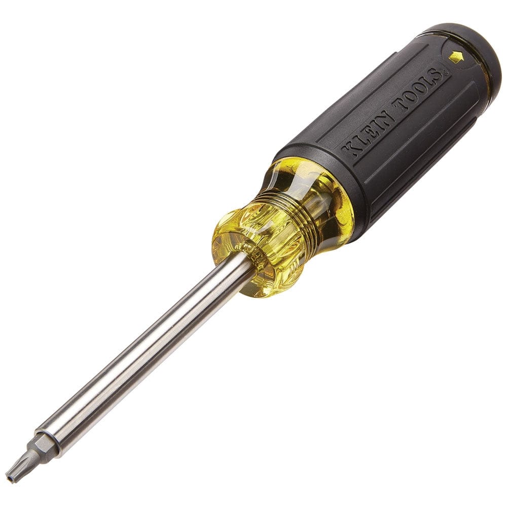 A professional product photograph of the Klein Tools 32307 27-in-1 tamperproof multi-bit screwdriver featuring a black Cushion-Grip handle and a stainless steel magnetic barrel with a security Torx bit inserted.