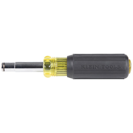 A profile view of the driver handle and shaft with the bit removed, illustrating the tool's conversion into a nut driver.