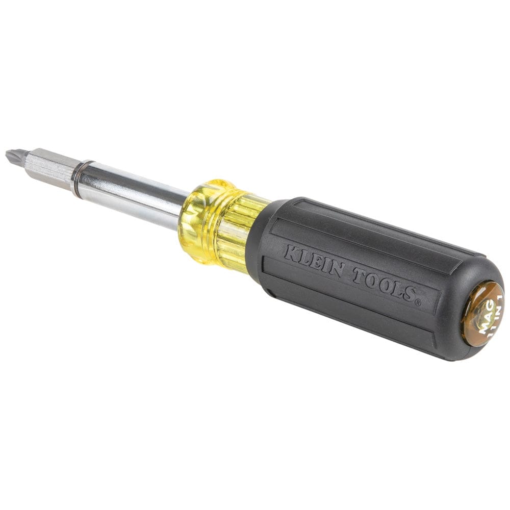 Side perspective of the 11-in-1 magnetic screwdriver, highlighting the "MAG 11 IN 1" text on the handle's yellow end cap and the ergonomic black rubber grip.