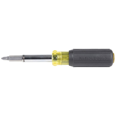 A standard side profile view of the fully assembled Klein Tools 11-in-1 magnetic multi-bit screwdriver and nut driver against a plain white background.