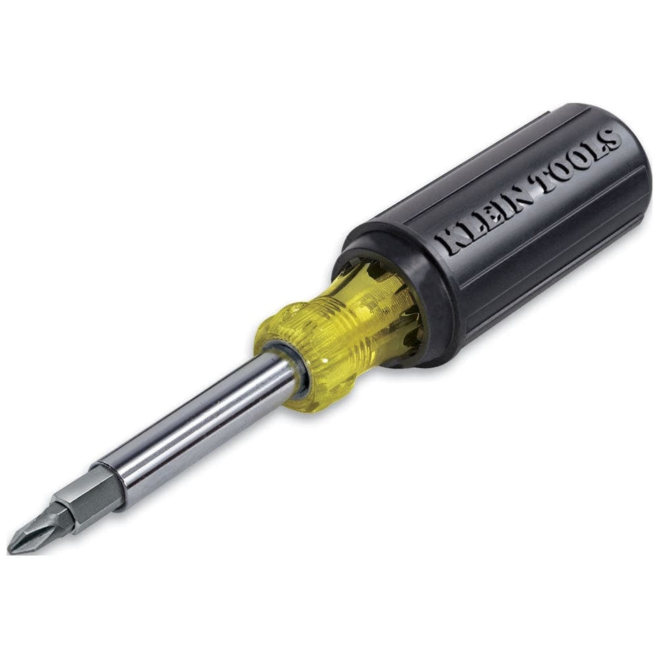 A studio product shot of the Klein Tools 32500 11-in-1 multi-bit screwdriver and nut driver featuring a black and yellow Cushion-Grip handle and a chrome-plated shank with a double-sided bit tip.
