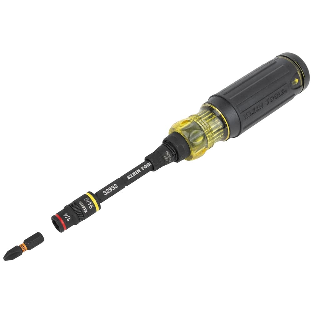 Angled view of the screwdriver with a Phillips bit detached from the tip to illustrate the magnetic bit holder and flip socket mechanism.