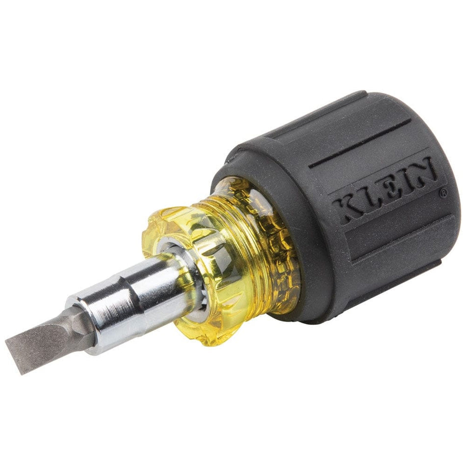 Studio shot of the Klein Tools 32561 stubby screwdriver featuring a black cushion-grip handle, yellow shaft collar, and a flathead bit inserted.
