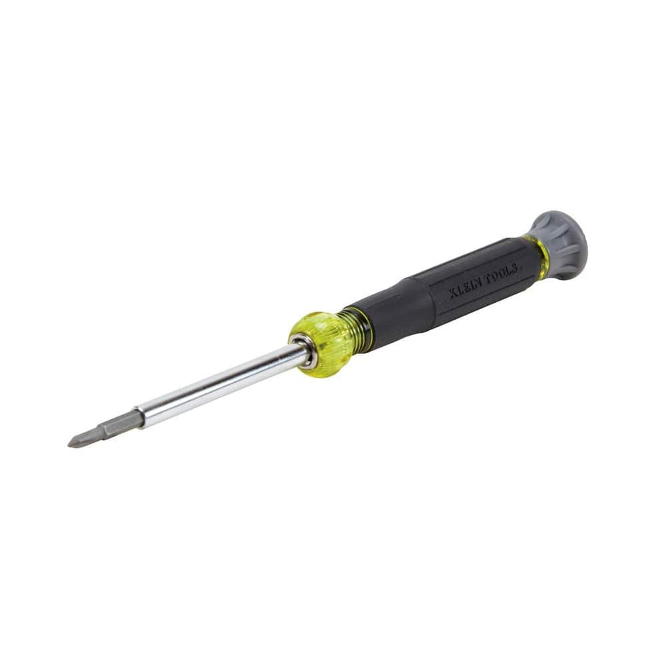 A studio shot of the Klein Tools 32581 4-in-1 multi-bit electronics screwdriver. The tool features a black and yellow Cushion-Grip handle, a gray rotating swivel cap at the end, and a chrome-plated barrel holding a precision bit.