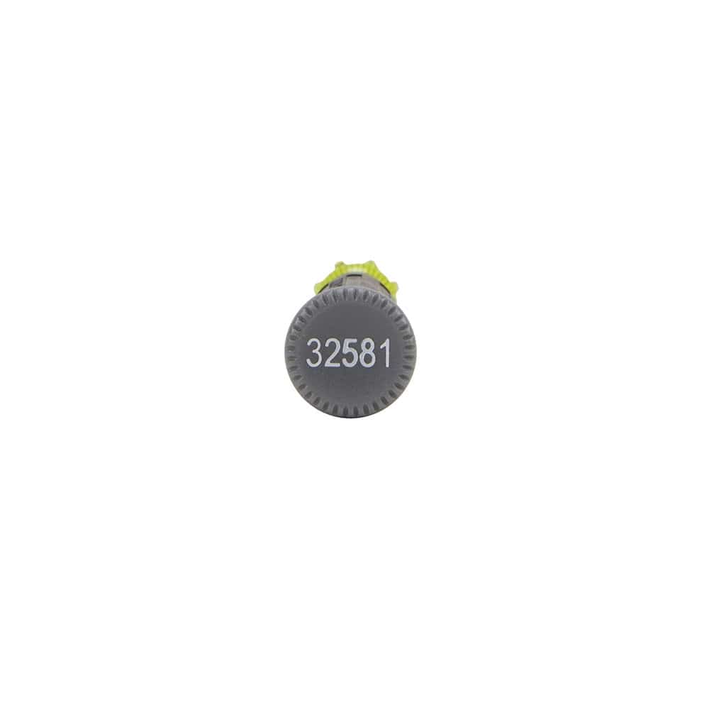 A direct view of the gray rotating end cap of the electronics screwdriver, prominently featuring the white model number 32581 printed on the flat surface.