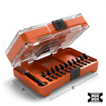 A perspective shot of the ultra-slim Klein Tools bit case with its clear lid partially open, highlighting the compact 5-inch by 3-inch dimensions and the MODbox modular storage system compatibility.