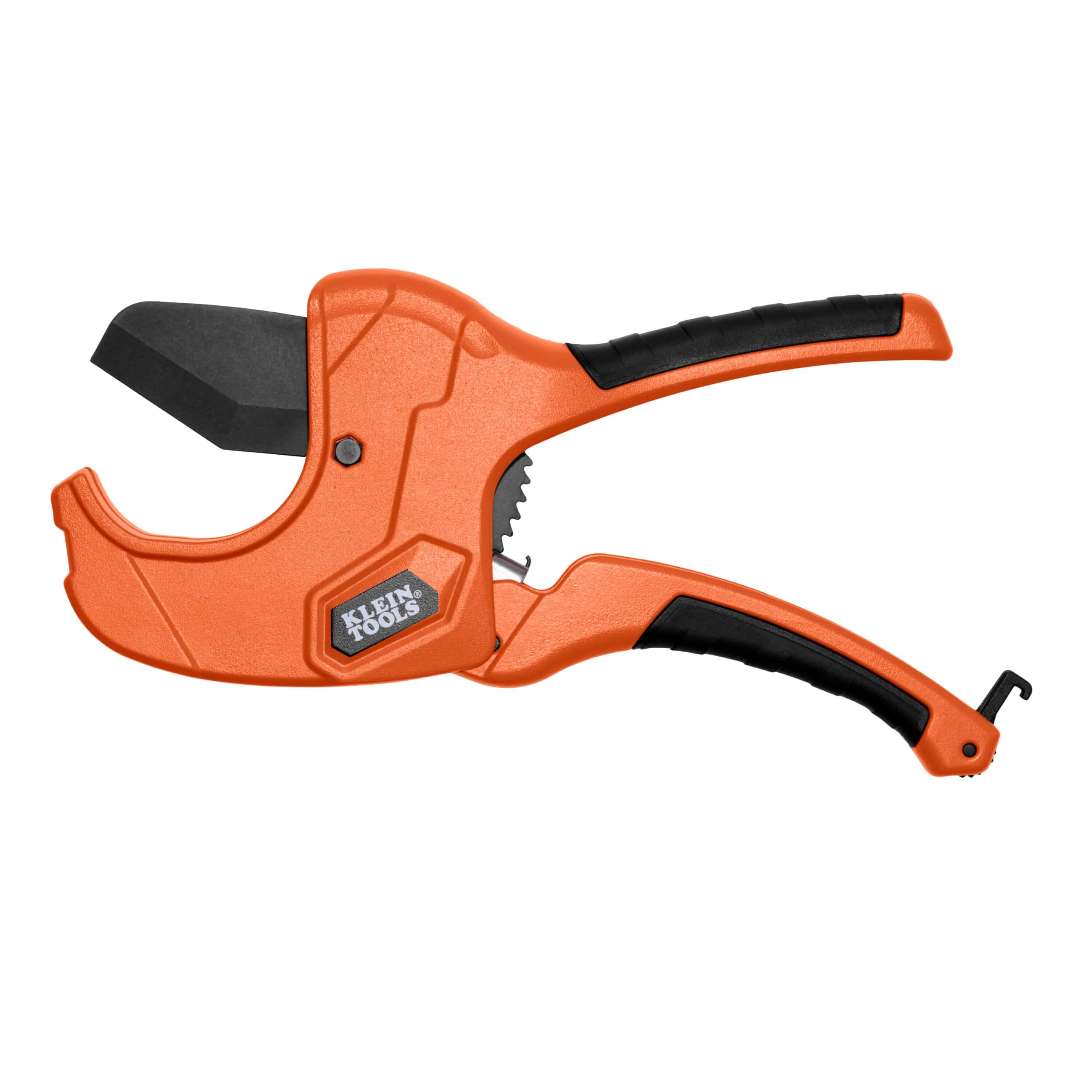 Klein Tools 50080 2-inch ratcheting plastic conduit pipe cutter full horizontal layout view, displaying the lightweight bright orange die-cast aluminum chassis body, a black oxide wedge cutting blade, ergonomic textured handle grip panels, and a structural steel storage retention hook isolated on a white background.