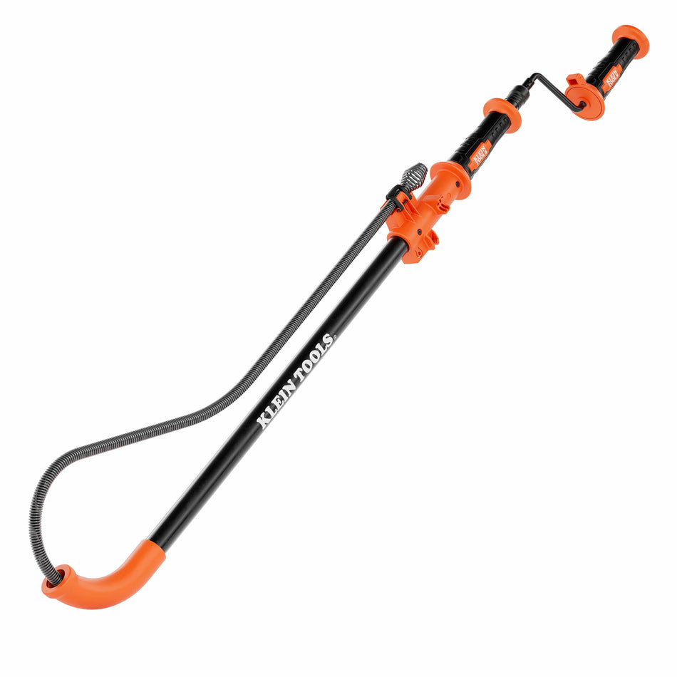Full-length view of the Klein Tools 53018 extendable toilet auger featuring a 6-foot steel coil, orange mar-resistant protective boot, and an ergonomic hybrid handle for manual or drill operation.