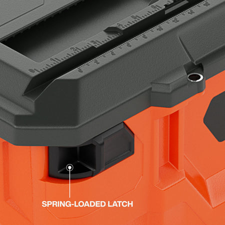 Close-up view of the heavy-duty spring-loaded latch mechanism and the molded-in ruler on the lid of the MODbox medium storage case.