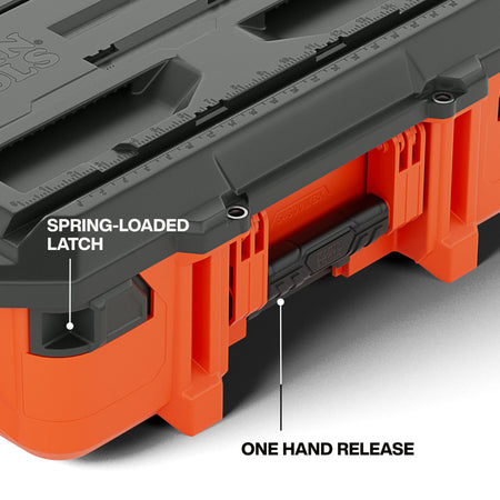 Close-up of the front of the small toolbox highlighting the heavy-duty spring-loaded latch and the one-hand release mechanism used to detach the box from a modular stack.