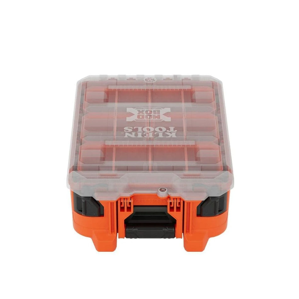 Front perspective view of the orange Klein Tools 54500MBX MODbox half-width tall component box featuring a clear impact-resistant lid and heavy-duty front latches for small parts organization.
