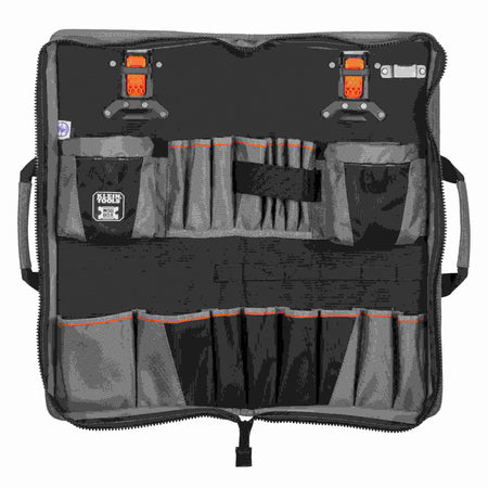 An open, multi-pocket tool apron made of durable black and gray fabric. It features several rows of pockets in various sizes, two secure clip-on attachment points at the top, and a full-perimeter zipper for closing the organizer.