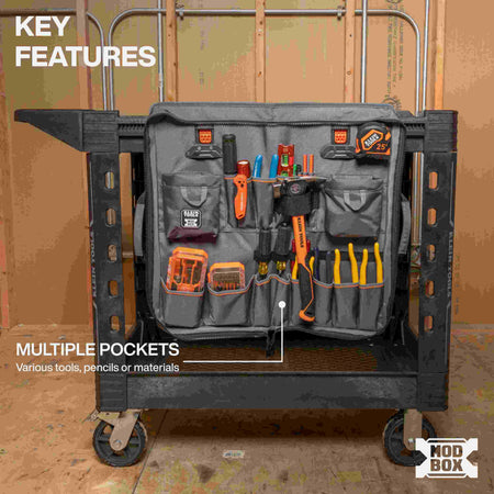 A MODbox Tool Apron attached to the side of a utility cart, fully loaded with various tools including a hammer, screwdrivers, pliers, a tape measure, and hardware bins. A caption points to the multiple pockets designed for various tools, pencils, or materials.