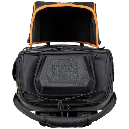 A top studio view of the Ironworker and Welder backpack. This angle showcases the heavy-duty aircraft cable reinforced handle and the hard-shell top compartment designed to protect sensitive electronics and safety glasses from crushing or impact.