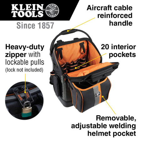 A technical infographic detail of the tradesman backpack. Callouts emphasize the aircraft cable reinforced handle for heavy lifting, the 20 high-visibility orange interior pockets for tool organization, heavy-duty zippers with lockable pulls, and the adjustable welding helmet pocket.
