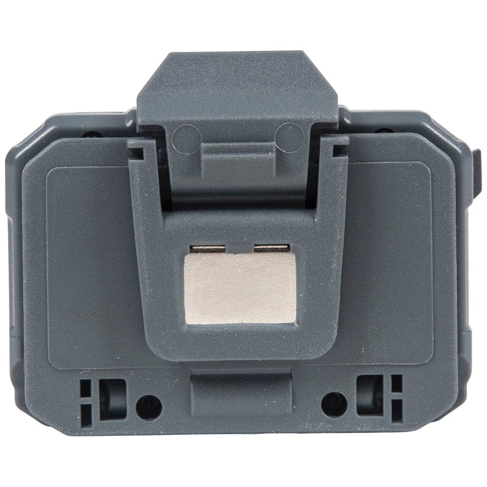 The rear view of the headlamp unit, showing the mounting clip and the rectangular integrated magnet used for stationary mounting.