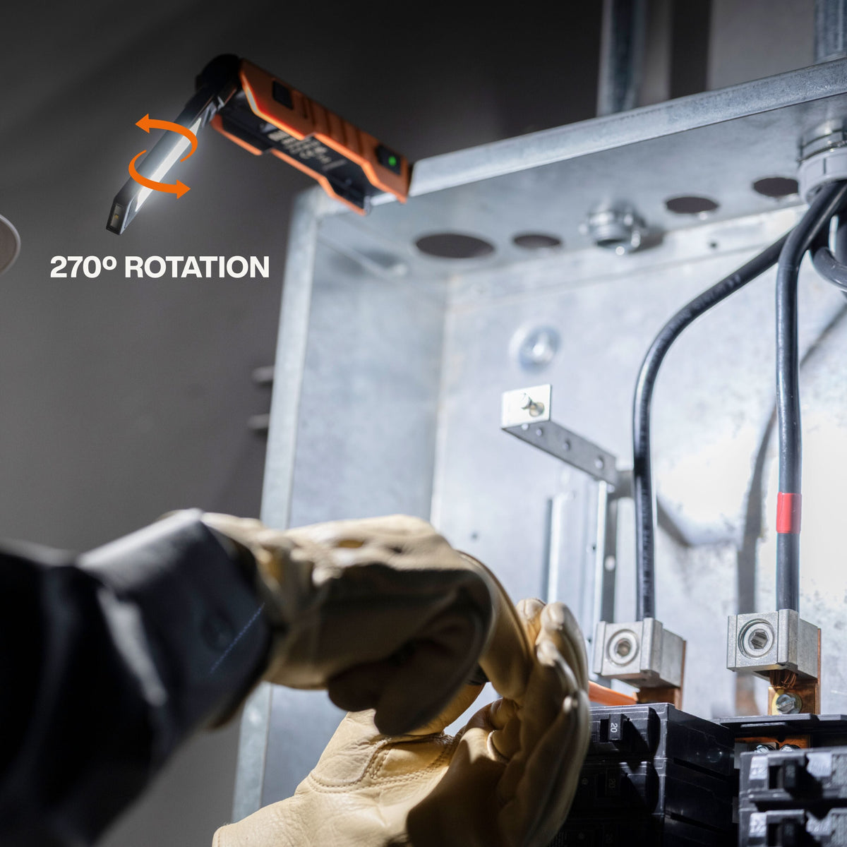 The 56073 LED work light shown in an inspection setting, highlighting the 270-degree rotation of the slim light head to direct 500 lumens of brightness into a dark industrial enclosure.