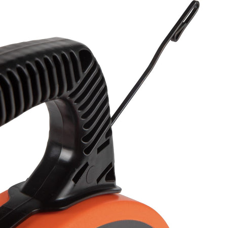 Close-up detail of the tape exit point on the reel showing the steel tape feeding out near the black handle base.