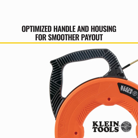 Close-up shot of the optimized handle and housing on the Klein Tools 56380 fish tape, designed to provide a smoother payout and a firm, steady grip for professional wire pulling applications.
