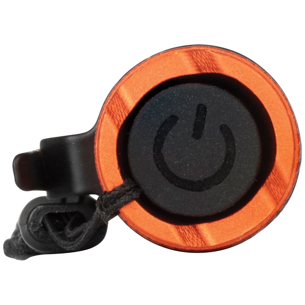 An end-cap view of the flashlight focusing on the ergonomic textured power button, designed for easy cycling through the High, Medium, Eco, and Strobe lighting modes even while wearing work gloves.