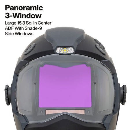 A side profile view of the Klein Tools panoramic welding helmet. The image showcases the sleek aerodynamic design, the external adjustment knobs, and the side-view windows that provide a 180-degree field of vision for safer jobsite navigation.