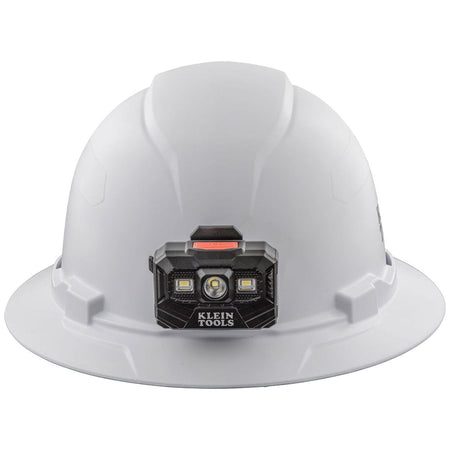A front-facing view of the Klein Tools Class E hard hat with the included 300-lumen rechargeable LED headlamp centered on the brim for optimal work light distribution.